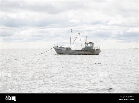 Anchored Fishing Boat Stock Photo Alamy