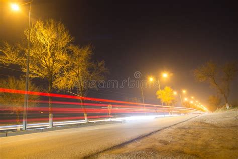 Road at Night with Moving Cars Stock Image - Image of dusk, abstract: 108617549