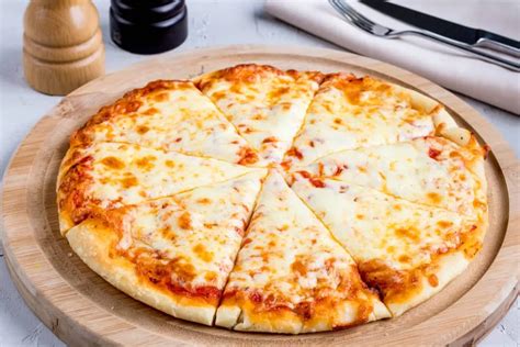 Homemade Four Cheese Pizza To Satisfy Your Cravings Kitchenatics Kitchen Products Cookware