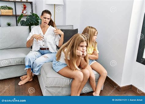 Mother And Daughters Angry For Sisters Problem At Home Stock Image