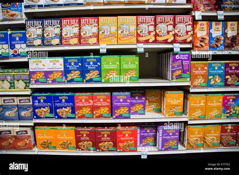 A Natural Foods Grocery Store Aisle With Shelves Of Healthy Snack Foods