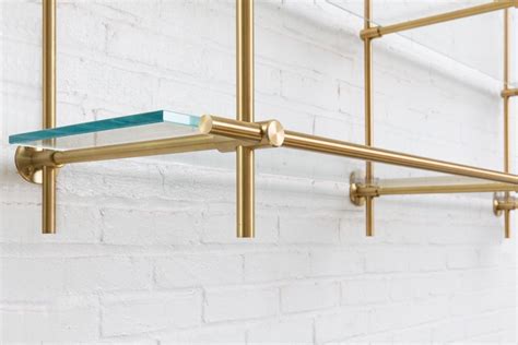 Details Of Our Collector S Shelving System Brass Finishing And Glass