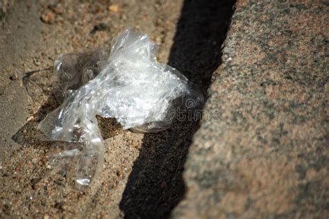 Crumpled Industrial Plastic Packaging Was Thrown Out Stock Photo