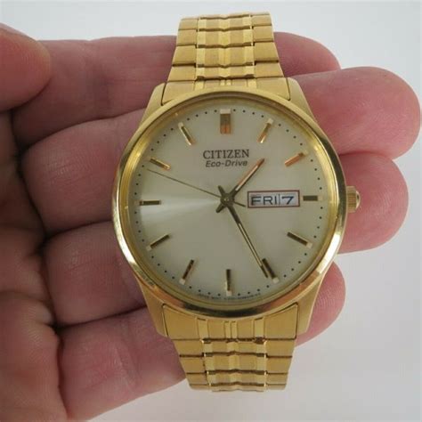 Authentic Citizen Eco Drive Mens Gold Tone Stainless Steel Watch E101