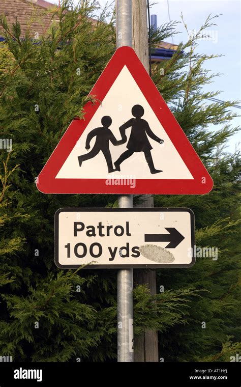 English Road Sign Triangle Warning That Their Is A School Ahead Stock