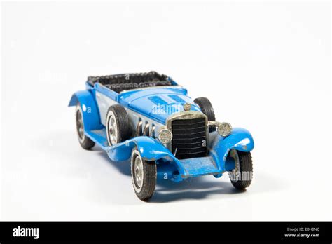 blue toy vintage model car on white Stock Photo - Alamy