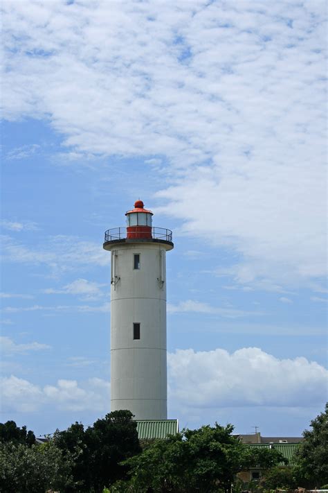 Free Images Sea Coast Cloud Lighthouse Sky White Bush Tower