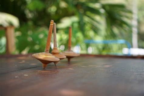 Wooden Gasing or Top Spinning from Yogyakarta, Indonesia Stock Image - Image of metal, spinning ...