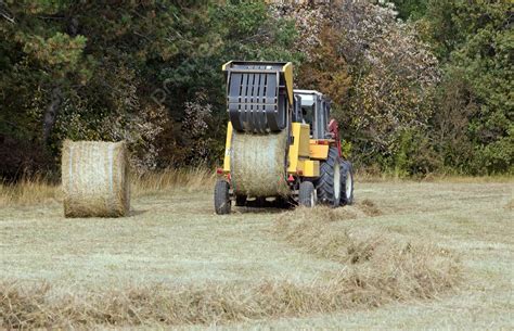 Press Machine Ejects Straw Bales Releasing Bale Ball Photo Background