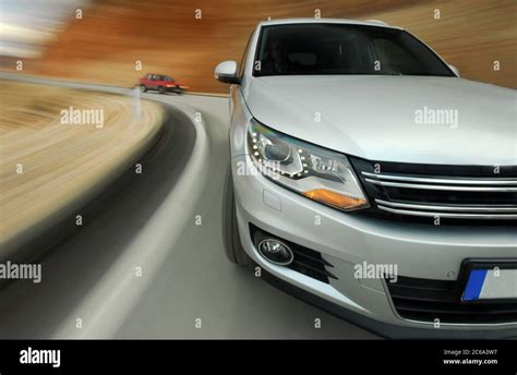 Dynamic Driving An Suv In A Curve Stock Photo Alamy