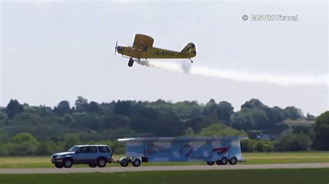 Stunt Plane Successfully Lands On A Moving Trailer YouTube