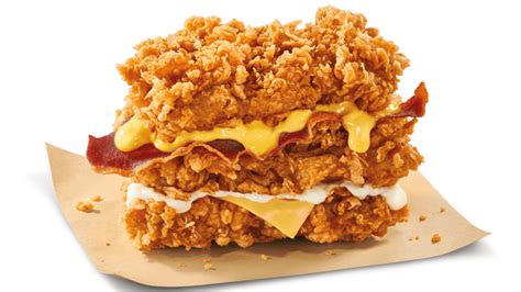 KFC's New Triple-Decker Chicken Burger Is A Bun-Less Heart Attack In ...