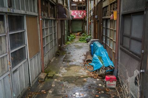 The overgrown beauty of a long abandoned Japanese shopping arcade ...