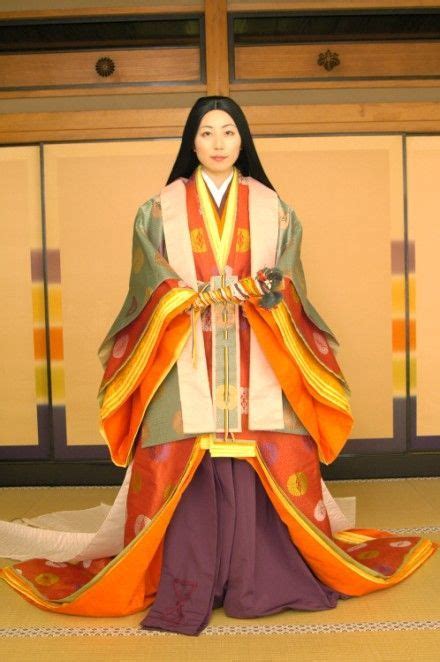 A Woman Dressed In Junihitoe At A Kimono Photography Experience