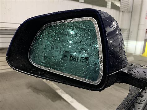 Is this side mirror tint normal?? I can’t see a thing when rainy/dark