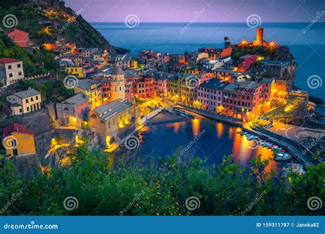 Stunning Fishing Village With Colorful Houses At Evening Vernazza