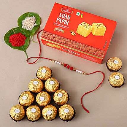 Online White Pearl And Velvet Beads Rakhi With Grams Soan Papdi And