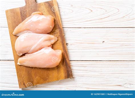 Fresh chicken breast raw stock photo. Image of closeup - 162901580