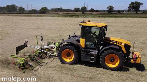 D E Keeble S Fastrac Pulling Their New Claas Volto Tedder