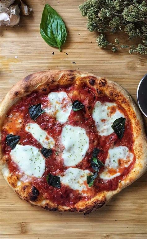 The Classic Margherita Pizza Simply Made With Mozzarella Tomato Sauce