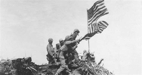 Raising The Flag On Iwo Jima The Story Behind Ww2s Most Iconic Photo