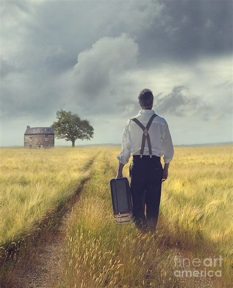 Man Walking Down Road With Suitscase Photograph By Sandra Cunningham