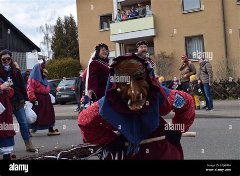 A Group Of People Dressed In Medieval Attire During A Traditional Fool