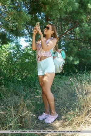 Busty Brunette In Blue Shorts And Pink Top Undressing An XXX Dessert