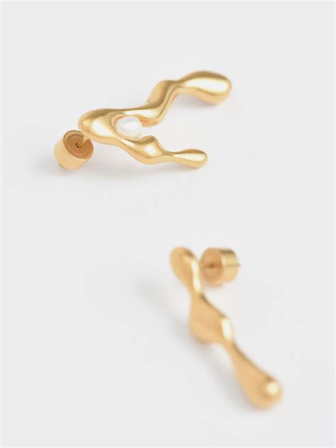 Bronze Gold Sculpted Mismatch Earrings Charles And Keith Sa