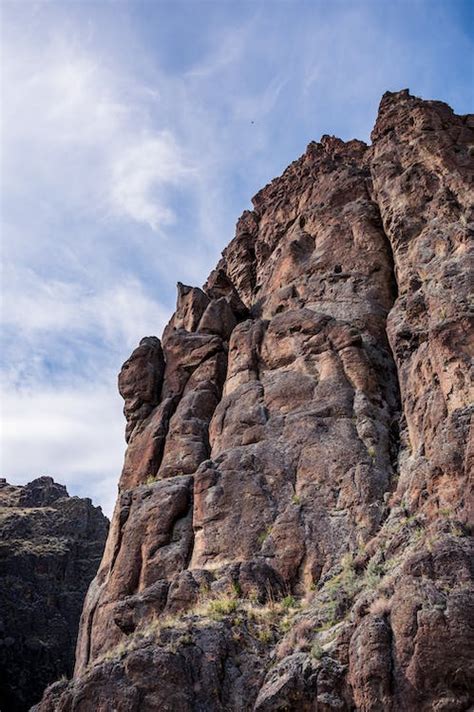 Rocky Ravine With Cliffs On Sunny Day · Free Stock Photo