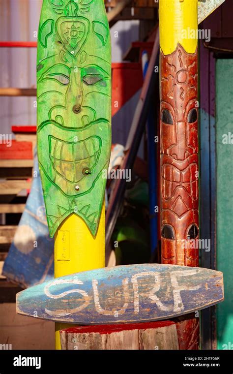 Vertical Shot Of Creative Wood Carvings In A Surf Shop On La Boca Beach