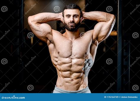 Bodybuilder Strong Man Pumping Up Abs Muscles Stock Image Image Of