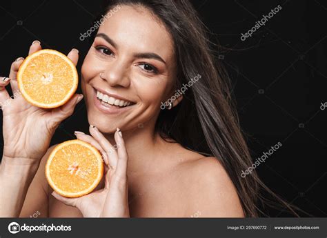 Beautiful Naked Woman Posing Isolated Over Black Wall Background Stock