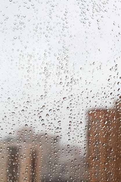 Premium Photo Raindrops On Home Glass Window