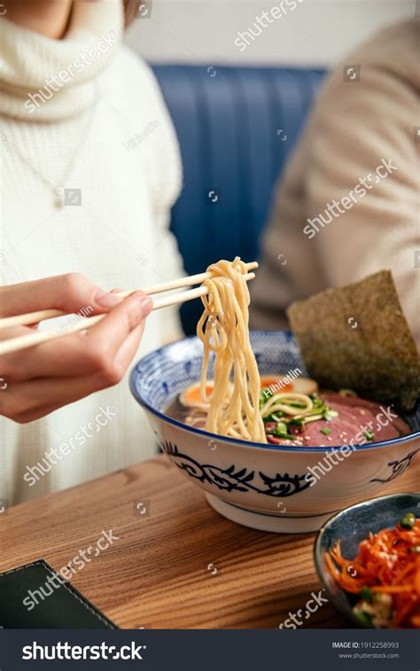 Eating Japanese Shoyu Ramen Noodle Soup With Chopsticks Artofit