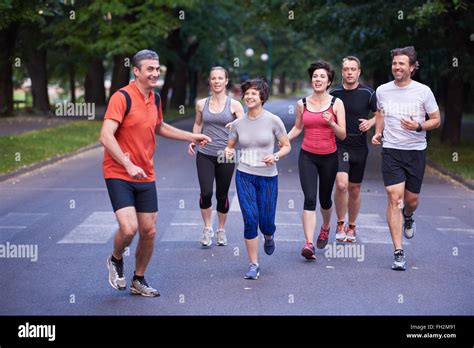 People Group Jogging Stock Photo Alamy