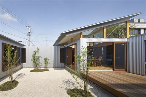 Arii Irie Architects Uses Angled Windows And Tilted Roofs For Japanese House Extension