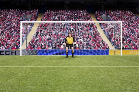 Goalkeeper Standing In Goal Stock Photo