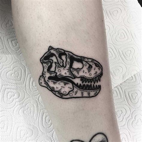 T-Rex skull tattoo by Deborah Pow - Tattoogrid.net