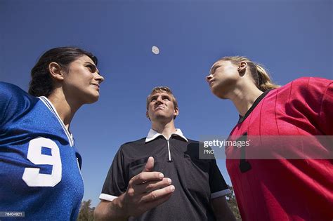 Referee Flipping Coin High Res Stock Photo Getty Images