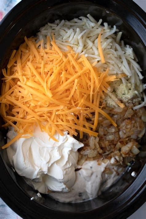 Slow Cooker Cheesy Hash Brown Potatoes Thecarefreekitchen Easy Potato Recipes Cheesy