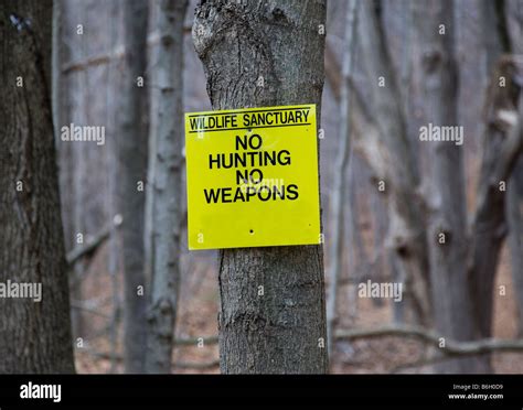 Sign at a wildlife sanctuary Stock Photo - Alamy