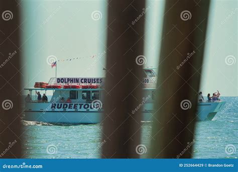 Rudee Tours Dolphin Cruise Thru a Pier Stock Image - Image of virgi ...