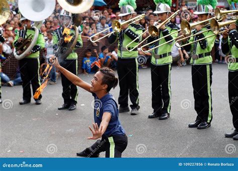 Band Male Majorette Perform Various Skills During The Annual Brass Band