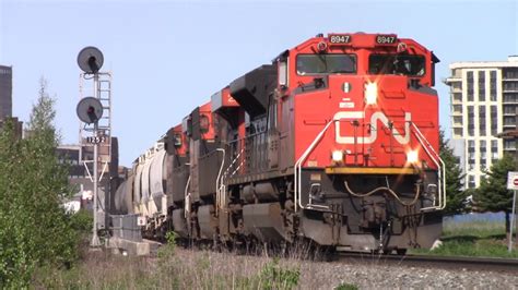 Three Engines Lead Manifest Train Cn Into Moncton Nb Youtube