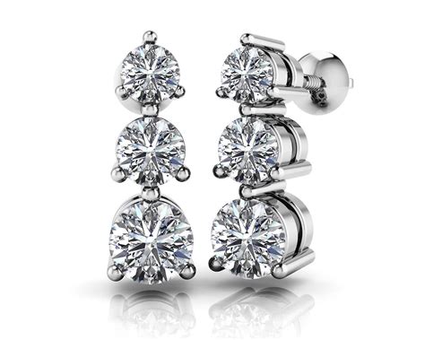 Triple Diamond Drop Earrings In White Gold Yellow Gold And Platinum