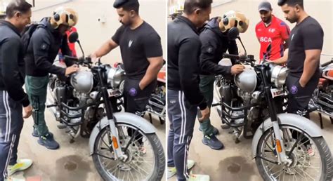 Watch Ms Dhoni Signs Autograph On Royal Enfield Bike Video Goes Viral