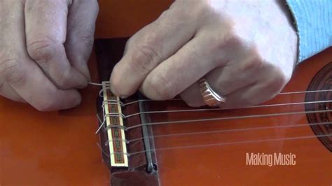 How To Restring A Classical Guitar Youtube