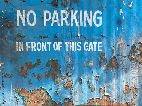 No Parking In Front Of This Gate Is Written On A Metallic Surface Stock