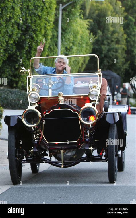 Jay Leno Drives Through Beverly Hills In A Vintage Classic Automobile